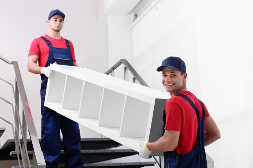 Packed office furniture and equipment ready for a business move