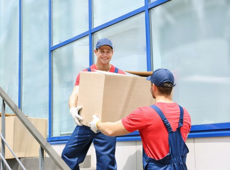 Packing boxes for a home move in Ealing