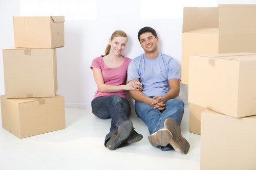 Loading items into a moving van during a house move