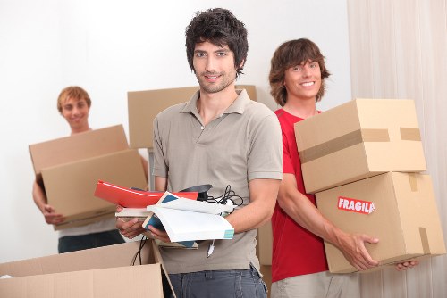 Boxes and study furniture prepared for student removals in Ealing