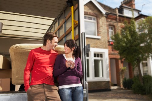 Careful loading of sofas and tables for a local move in Ealing