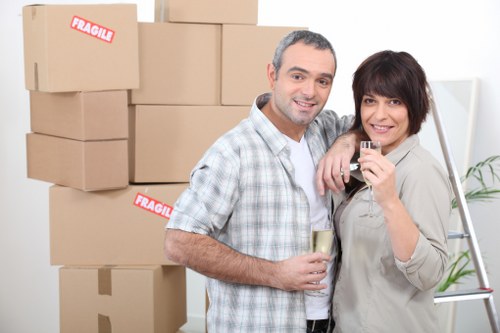 Professional movers assisting with a flat move near Ealing Broadway