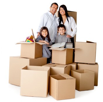 Loading furniture and boxes into a removal van in Ealing